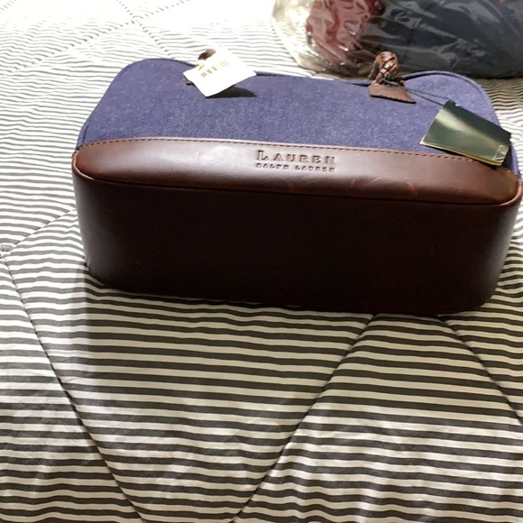 Brand new Ralph Lauren satchel bag.the bag has leather trim with woven handles. - Picture 2 of 3